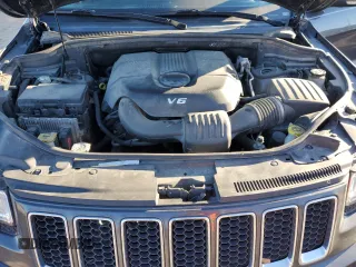 2014 Jeep Grand Cherokee Overland with VIN 1C4RJECG7EC522043, listed as a Copart auction lot 45183825 with 211,036 mi miles and Salvage Title. Bid and sale history available at carsss.com. Image 13.