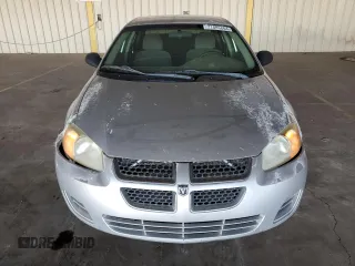 2004 Dodge Stratus SXT z VIN 1B3EL46X44N302796, wystawiony jako Copart lot #71885804 z przebiegiem 293 436 mil mil oraz Tytuł czysty. Historia ofert i sprzedaży dostępna na DreamBid. Obrazek 5.