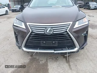 2016 Lexus RX 350 z VIN 2T2ZZMCA5GC029529, wystawiony jako IAAI lot #41953567 z przebiegiem 133 460 mil mil oraz . Historia ofert i sprzedaży dostępna na DreamBid. Obrazek 6.