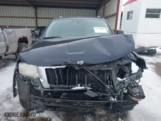 2011 Jeep Grand Cherokee Laredo with VIN 1J4RR4GG0BC610046, listed as a IAAI auction lot 41730587 with 177,032 mi miles. Bid and sale history available at carsss.com. Image 12.