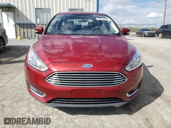 2015 Ford Focus Titanium с VIN 1FADP3N29FL215818, выставлен на аукционе Copart как лот 55442525 с пробегом 128 887 миль миль и Списание • Salvage title. История ставок и продаж доступна на DreamBid. Изображение 5.