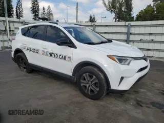 2018 Toyota RAV4 LE with VIN JTMZFREV4JJ165124, listed as a Copart auction lot 42729615 with 95,205 mi miles and Salvage Title. Bid and sale history available at carsss.com. Image 4.