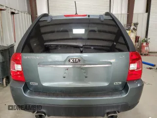 2009 Kia Sportage LX with VIN KNDJE723X97561560, listed as a Copart auction lot 49766995 with 130,623 mi miles and Salvage Title. Bid and sale history available at DreamBid. Image 6.