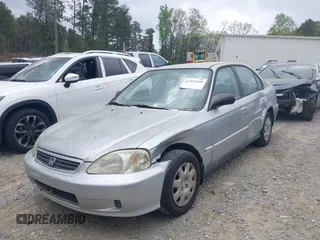 2000 Honda Civic VP with VIN 2HGEJ6611YH524336, listed as a IAAI auction lot 41957499 with 160,638 mi miles. Bid and sale history available at carsss.com. Image 2.