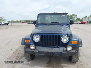 2004 Jeep Wrangler X with VIN 1J4FA39S64P726711, listed as a IAAI auction lot 42227336 with Not Provided miles and . Bid and sale history available at DreamBid. Image 12.