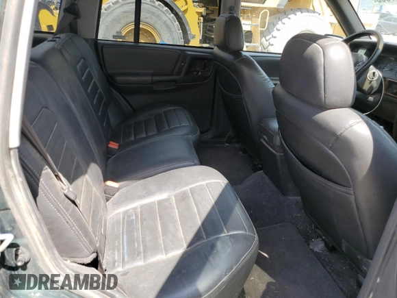 1996 Jeep Grand Cherokee Laredo z VIN 1J4GZ58S8TC222435, wystawiony jako Copart lot #62347665 z przebiegiem 202 125 mil mil oraz Czysty tytuł • Clean title. Historia ofert i sprzedaży dostępna na DreamBid. Obrazek 11.