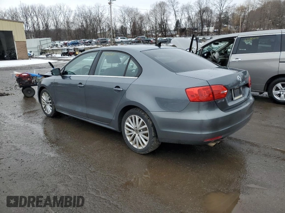 2012 Volkswagen Jetta Sedan SEL w/Sunroof with VIN 3VWLX7AJ6CM452705, listed as a Copart auction lot 43408495 with 140,878 mi miles and Salvage Title. Bid and sale history available at carsss.com. Image 2.