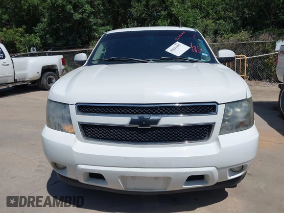 2007 Chevrolet Tahoe LS with VIN 1GNFC13007R310861, listed as a IAAI auction lot 42621401 with 241,291 mi miles and . Bid and sale history available at DreamBid. Image 6.