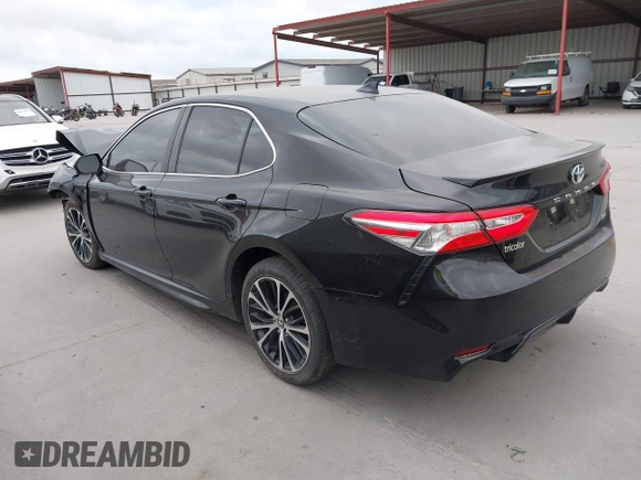 2020 Toyota Camry SE with VIN 4T1G11AK9LU946138, listed as a IAAI auction lot 42052004 with 99,583 mi miles. Bid and sale history available at carsss.com. Image 3.