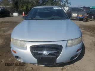 1997 Chrysler Sebring LXi z VIN 4C3AU52NXVE180034, wystawiony jako Copart lot #73413994 z przebiegiem 123 637 mil mil oraz Tytuł czysty. Historia ofert i sprzedaży dostępna na DreamBid. Obrazek 5.