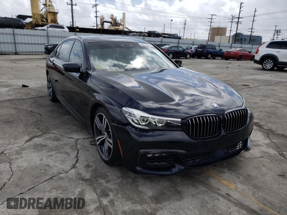2016 BMW 7 Series 740i with VIN WBA7E2C54GG548312, listed as a Copart auction lot 45716263 with 74,249 mi miles. Bid and sale history available at carsss.com. Image 4.
