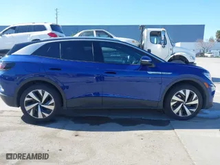 2021 Volkswagen ID.4 Pro S with VIN WVGUNPE2XMP057515, listed as a IAAI auction lot 41665322 with 22,146 mi miles. Bid and sale history available at carsss.com. Image 14.