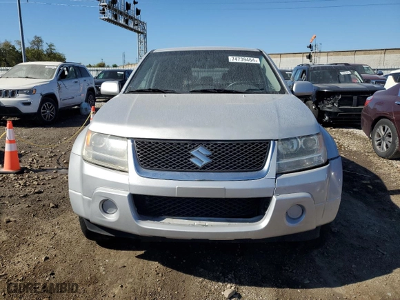 2012 Suzuki Grand Vitara Premium with VIN JS3TD0D21C4100409, listed as a Copart auction lot 74739464 with 133,412 mi miles and Salvage Title. Bid and sale history available at carsss.com. Image 5.