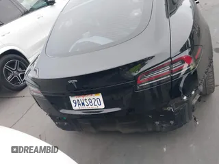 2022 Tesla Model S with VIN 5YJSA1E55NF474342, listed as a IAAI auction lot 41870994 with 33,804 mi miles and . Bid and sale history available at DreamBid. Image 17.