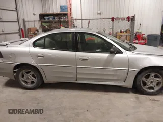 2003 Pontiac Grand Am GT with VIN 1G2NW52E93M605453, listed as a IAAI auction lot 41546839 with 202,918 mi miles. Bid and sale history available at carsss.com. Image 13.