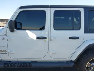 2020 Jeep Wrangler Unlimited Sahara with VIN 1C4HJXEN5LW277208, listed as a IAAI auction lot 41640906 with 61,774 mi miles. Bid and sale history available at carsss.com. Image 14.
