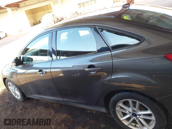 2016 Ford Focus SE with VIN 1FADP3F28GL330815, listed as a IAAI auction lot 41696821 with 125,247 mi miles. Bid and sale history available at carsss.com. Image 14.