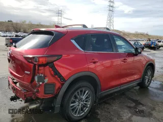 2017 Mazda CX-5 Touring with VIN JM3KFBCL2H0130289, listed as a Copart auction lot 51287885 with 70,170 mi miles and Salvage Title. Bid and sale history available at carsss.com. Image 3.