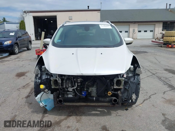 2016 Ford Escape Titanium with VIN 1FMCU9J98GUA00832, listed as a IAAI auction lot 42188941 with 90,764 mi miles and . Bid and sale history available at DreamBid. Image 12.
