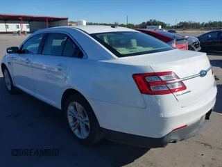 2015 Ford Taurus SEL with VIN 1FAHP2E8XFG182899, listed as a IAAI auction lot 41209454 with 93,477 mi miles and . Bid and sale history available at carsss.com. Image 3.