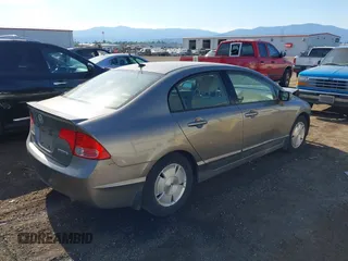 2006 Honda Civic z VIN JHMFA36246S010351, wystawiony jako IAAI lot #42448952 z przebiegiem 133 551 mil mil oraz . Historia ofert i sprzedaży dostępna na DreamBid. Obrazek 4.