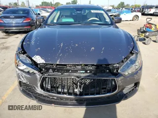 2016 Maserati Ghibli S Q4 z VIN ZAM57RTA8G1173582, wystawiony jako Copart lot #56072145 z przebiegiem Nie podano mil oraz Szkody całkowita. Historia ofert i sprzedaży dostępna na DreamBid. Obrazek 5.