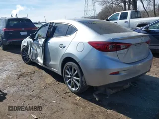 2018 Mazda 3 Touring z VIN 3MZBN1V36JM205904, wystawiony jako IAAI lot #41586707 z przebiegiem 145 401 mil mil oraz . Historia ofert i sprzedaży dostępna na DreamBid. Obrazek 3.