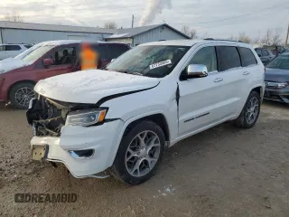 2020 Jeep Grand Cherokee High Altitude with VIN 1C4RJFCG1LC101888, listed as a Copart auction lot 87733565 with 64,240 mi miles and Salvage title. Bid and sale history available at DreamBid. Image 1.
