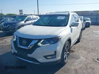 2018 Nissan Rogue S with VIN JN8AT2MT4JW469784, listed as a IAAI auction lot 41827157 with 67,838 mi miles and . Bid and sale history available at carsss.com. Image 2.