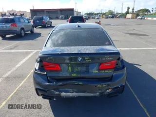 2018 BMW 5 Series M550i xDrive with VIN WBAJB9C51JB049513, listed as a IAAI auction lot 41146990 with 51,218 mi miles. Bid and sale history available at carsss.com. Image 17.