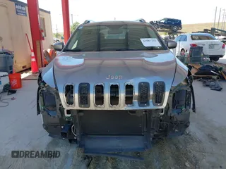 2015 Jeep Cherokee Latitude with VIN 1C4PJLCB1FW770806, listed as a IAAI auction lot 41887226 with 71,268 mi miles and . Bid and sale history available at DreamBid. Image 12.