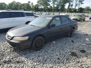 1999 Honda Accord LX with VIN JHMCG5644XC022106, listed as a Copart auction lot 60562855 with 220,740 mi miles and Salvage title. Bid and sale history available at DreamBid. Image 1.