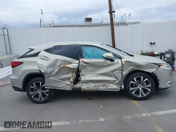 2020 Lexus RX with VIN 2T2HZMAA0LC166189, listed as a IAAI auction lot 41778489 with 49,408 mi miles. Bid and sale history available at carsss.com. Image 13.