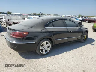 2014 Volkswagen CC Sport with VIN WVWBN7AN6EE529590, listed as a Copart auction lot 88780515 with 123,392 mi miles and Salvage Title. Bid and sale history available at DreamBid. Image 3.