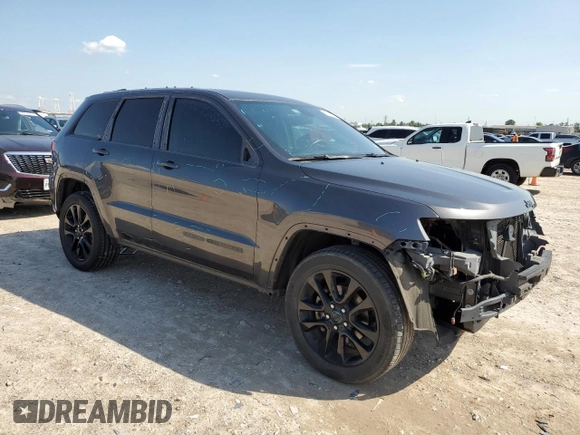 2017 Jeep Grand Cherokee Laredo with VIN 1C4RJEAG1HC854339, listed as a Copart auction lot 50432985 with 113,079 mi miles and Salvage Title. Bid and sale history available at carsss.com. Image 4.