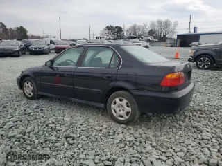 1999 Honda Civic EX with VIN 1HGEJ8641XL056616, listed as a Copart auction lot 45352295 with 162,291 mi miles and Salvage Title. Bid and sale history available at carsss.com. Image 2.
