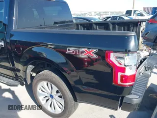 2018 Ford F-150 XL with VIN 1FTEW1C58JKC02382, listed as a IAAI auction lot 42010568 with 124,757 mi miles and . Bid and sale history available at DreamBid. Image 19.