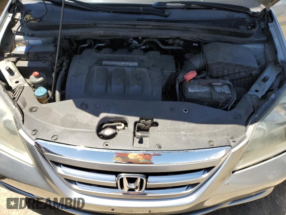 2006 Honda Odyssey EX-L z VIN 5FNRL38756B020403, wystawiony jako Copart lot #58294445 z przebiegiem 248 529 mil mil oraz Szkoda całkowita • Salvage title. Historia ofert i sprzedaży dostępna na DreamBid. Obrazek 12.