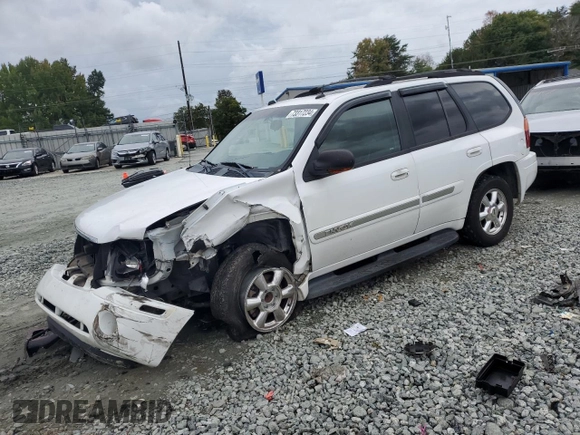 2005 GMC Envoy SLT with VIN 1GKDS13S652330496, listed as a Copart auction lot 73317234 with 191,138 mi miles and Salvage Title. Bid and sale history available at DreamBid. Image 1.