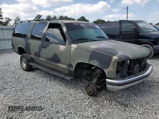 1996 GMC Suburban z VIN 3GKEC16R1TG516669, wystawiony jako Copart lot #69262744 z przebiegiem Nie podano mil oraz Szkoda całkowita • Salvage title. Historia ofert i sprzedaży dostępna na DreamBid. Obrazek 4.