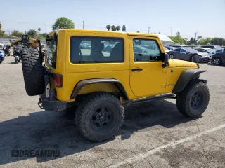 2015 Jeep Wrangler Rubicon Hard Rock with VIN 1C4BJWCG6FL568665, listed as a Copart auction lot 60282155 with 107,773 mi miles and Salvage title. Bid and sale history available at DreamBid. Image 3.