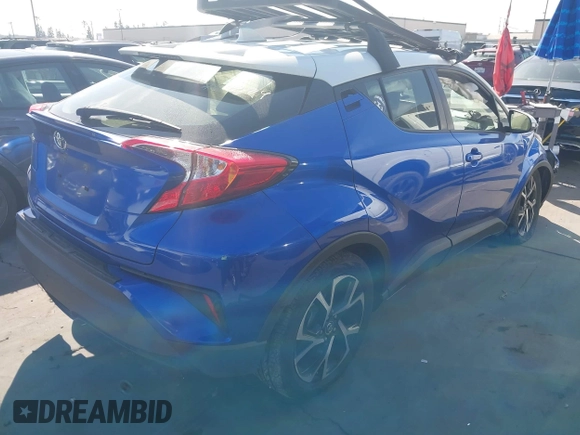 2019 Toyota C-HR XLE with VIN JTNKHMBX5K1043079, listed as a IAAI auction lot 41813367 with 77,879 mi miles and . Bid and sale history available at DreamBid. Image 4.