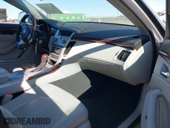 2013 Cadillac CTS Premium with VIN 1G6DP5E33D0175817, listed as a IAAI auction lot 41882197 with 116,645 mi miles and . Bid and sale history available at DreamBid. Image 5.
