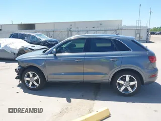 2015 Audi Q3 Prestige with VIN WA1GFCFS7FR013818, listed as a IAAI auction lot 41975076 with 60,295 mi miles and . Bid and sale history available at DreamBid. Image 15.