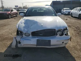 2007 Jaguar X-Type z VIN SAJWA51A07WJ14424, wystawiony jako Copart lot #84556864 z przebiegiem Nie podano mil oraz Szkody całkowita. Historia ofert i sprzedaży dostępna na DreamBid. Obrazek 5.