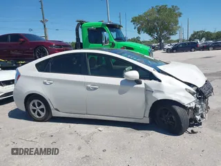 2012 Toyota Prius One with VIN JTDKN3DUXC5463795, listed as a IAAI auction lot 41977678 with 121,190 mi miles and . Bid and sale history available at DreamBid. Image 14.