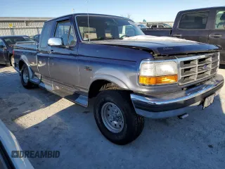1995 Ford F-150 with VIN 1FTEX14H5SKB08399, listed as a Copart auction lot 41827275 with 87,001 mi miles and Salvage Title. Bid and sale history available at carsss.com. Image 4.