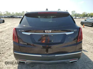 2021 Cadillac XT5 FWD Premium Luxury with VIN 1GYKNCRS2MZ180884, listed as a Copart auction lot 50433445 with 27,246 mi miles and Salvage Title. Bid and sale history available at carsss.com. Image 6.
