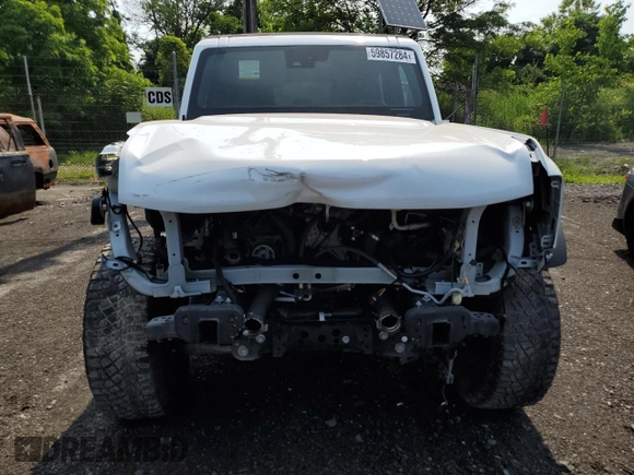 2021 Ford Bronco с VIN 1FMDE5DH7MLA97679, выставлен на аукционе Copart как лот 59857284 с пробегом 33 155 миль миль и Списание • Salvage title. История ставок и продаж доступна на DreamBid. Изображение 5.