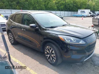 2020 Ford Escape SE Sport Hybrid with VIN 1FMCU9BZ4LUC25970, listed as a IAAI auction lot 42404984 with 102,651 mi miles and . Bid and sale history available at DreamBid. Image 1.